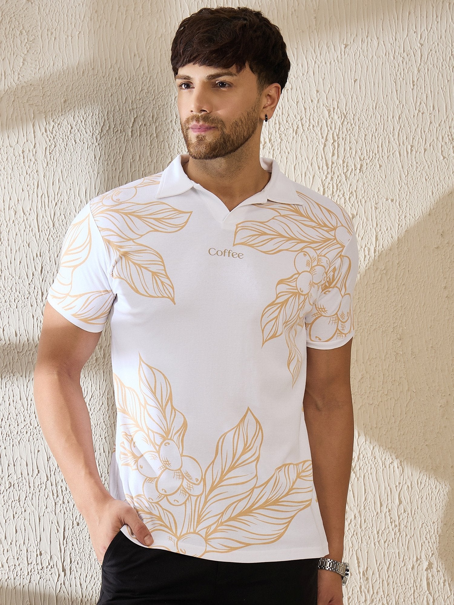 White polo shirt with embroidered botanical coffee art design