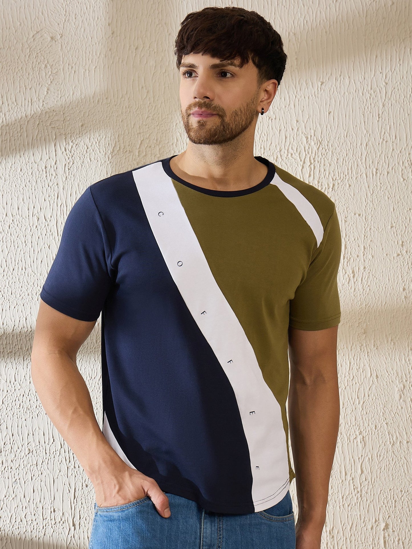 Classic blue crew neck t-shirt offering casual comfort with coffeehouse character